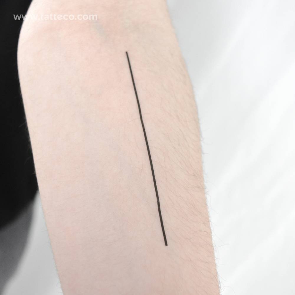 Straight line temporary tattoo located on the inner forearm.