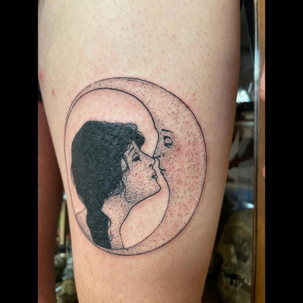 Dear Old Dixie Moon Song tattoo located on the thigh.