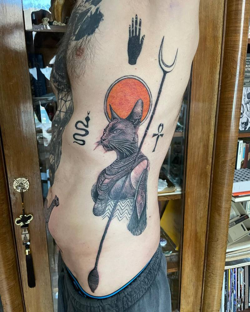 Huge Bastet tattoo done in illustrative style.