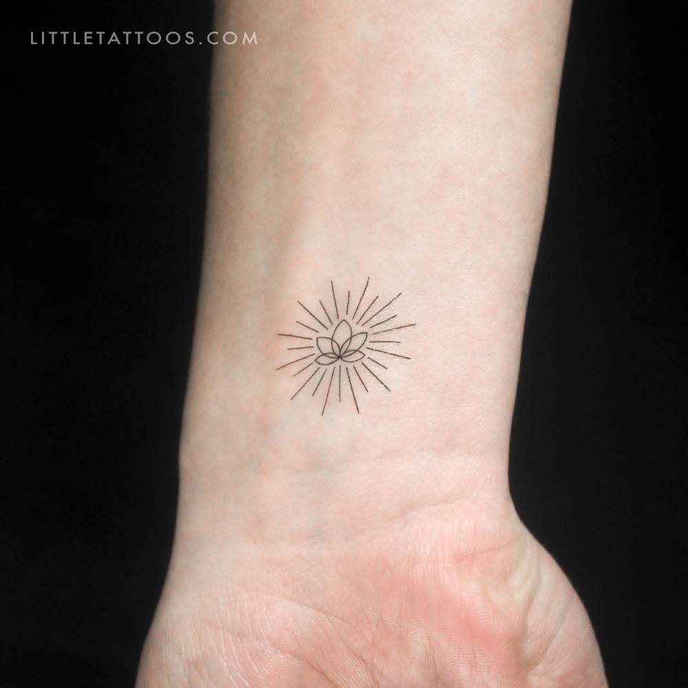 Small shiny lotus by Cagri Durmaz temporary tattoo.