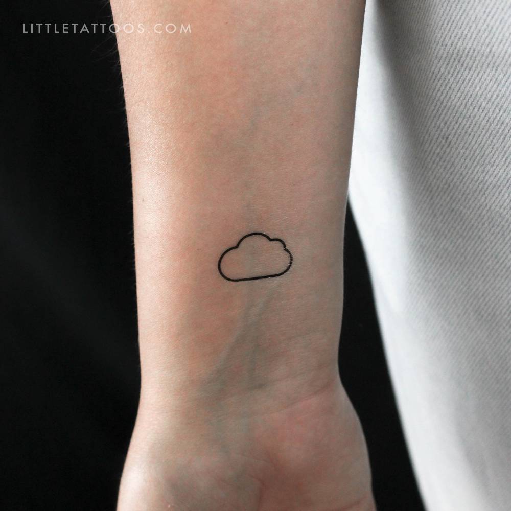 Cloud temporary tattoo in minimalistic style located on the wrist.