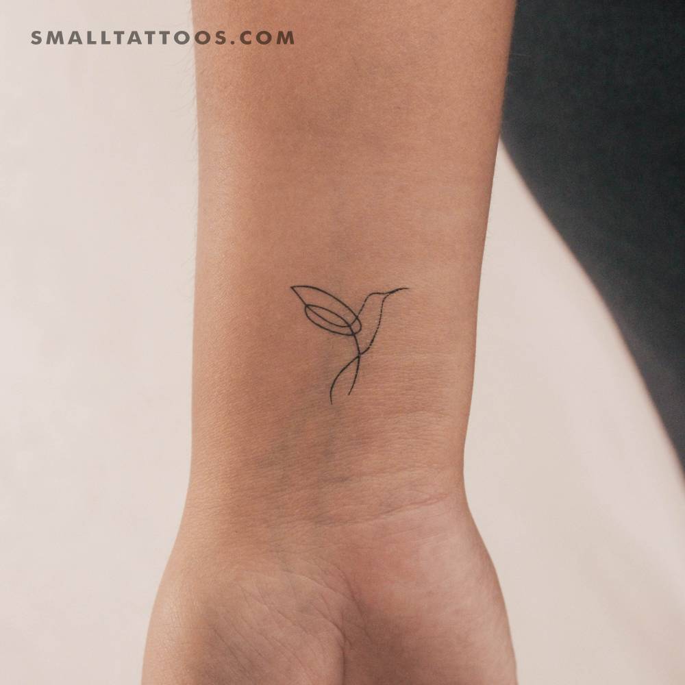 Single line hummingbird temporary tattoo placed on the wrist.