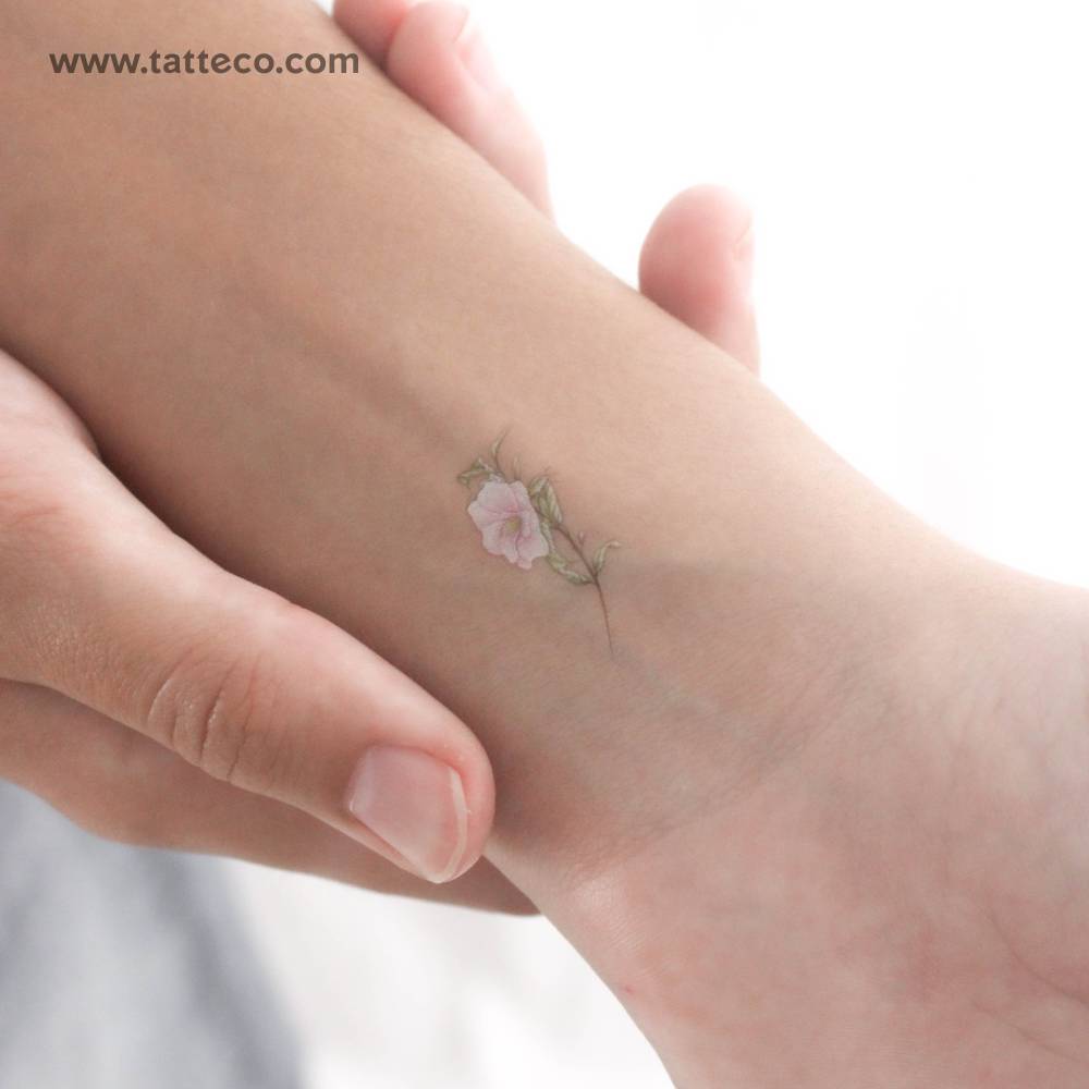 Small watercolor style camellia by Mini Lau temporary tattoo.