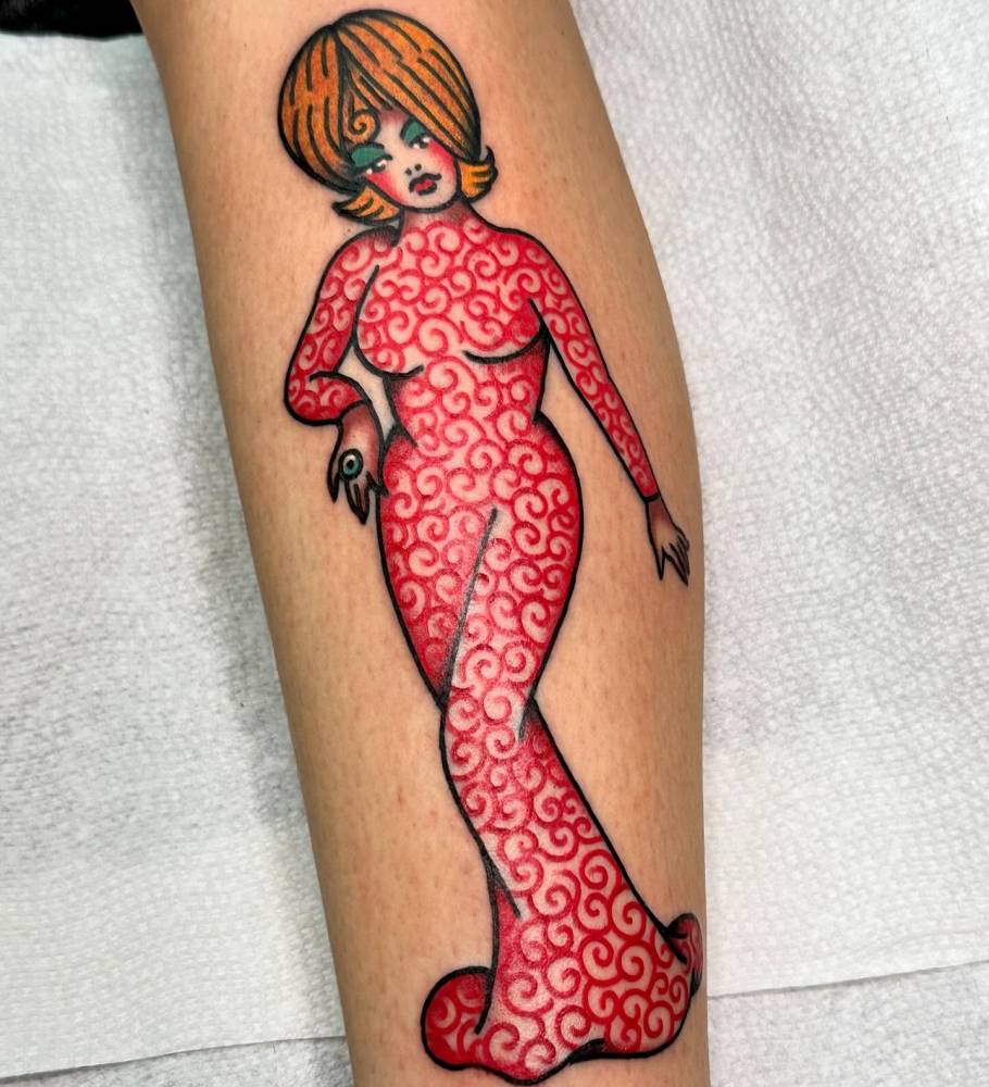 Martian Girl from 'Mars Attack' tattooed on the shin.