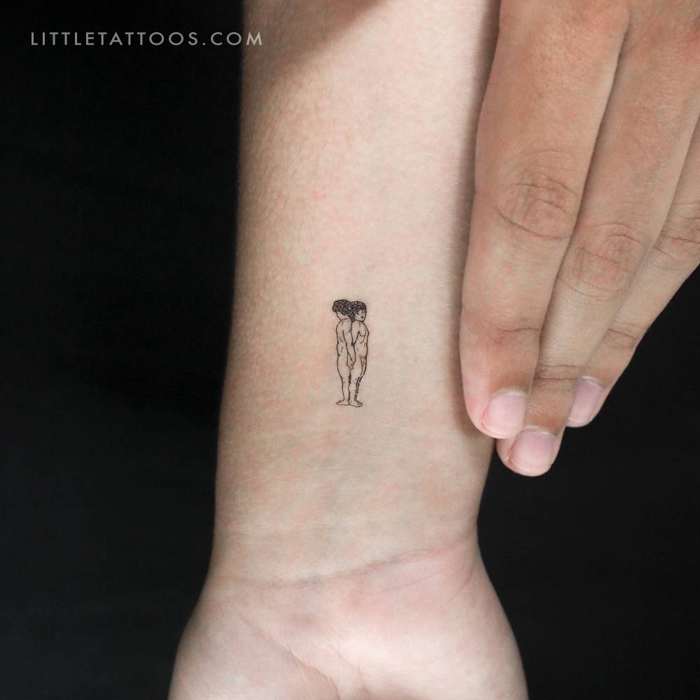 Minimalistic style twins temporary tattoo located on the wrist.