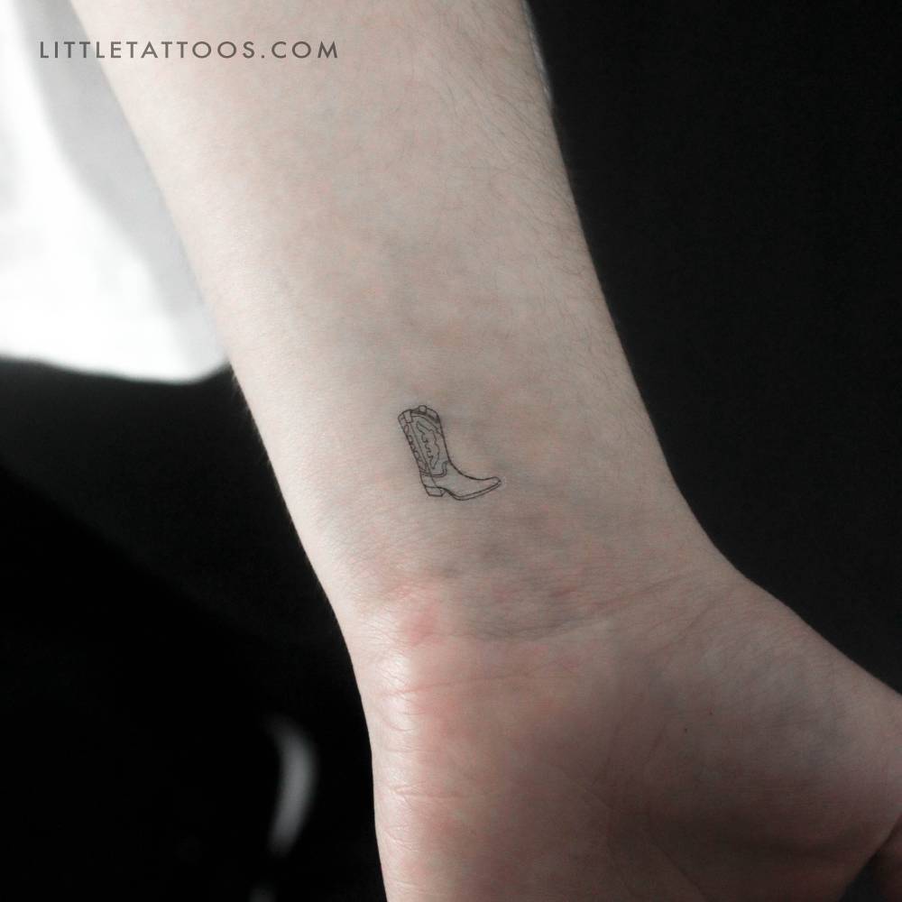 Fine line style cowboy boot temporary tattoo located on the wrist.
