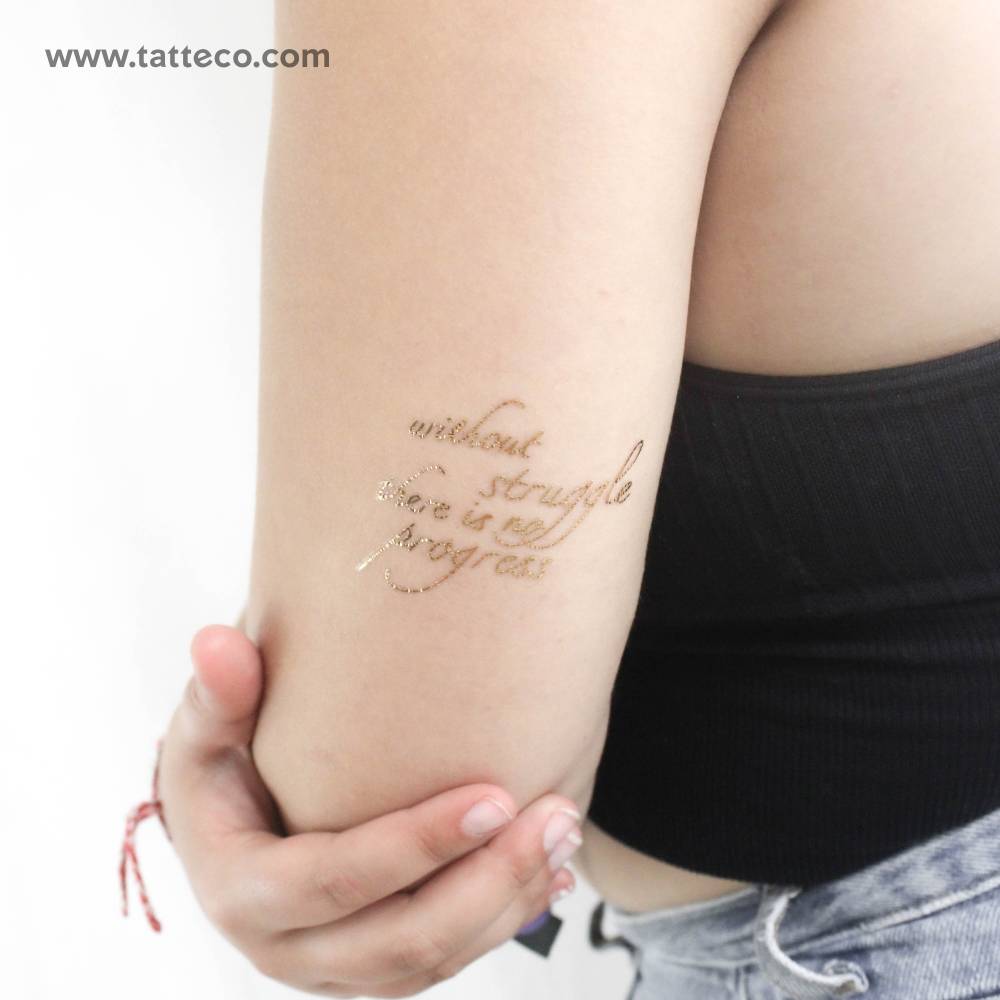 Metallic gold "without struggle there is no progress" temporary lettering tattoo.