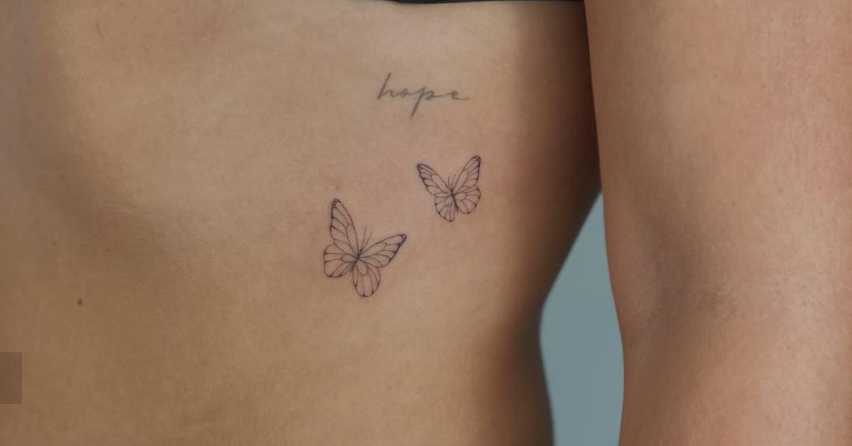 Butterfly couple tattoo done on the rib, fine line