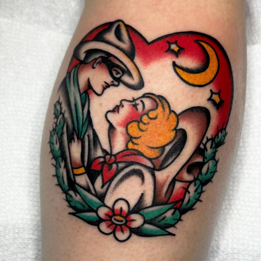 Lovers tattoo in traditional style located on the calf.