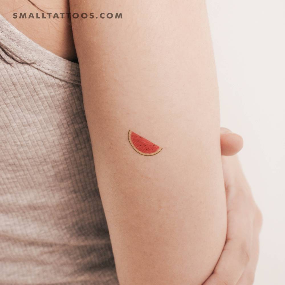 Watermelon temporary tattoo located on the tricep.