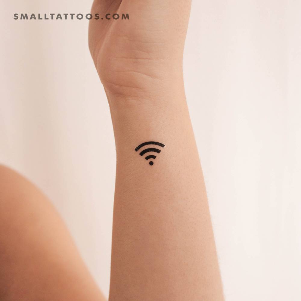 Minimalistic style Wifi symbol temporary tattoo located on the wrist.