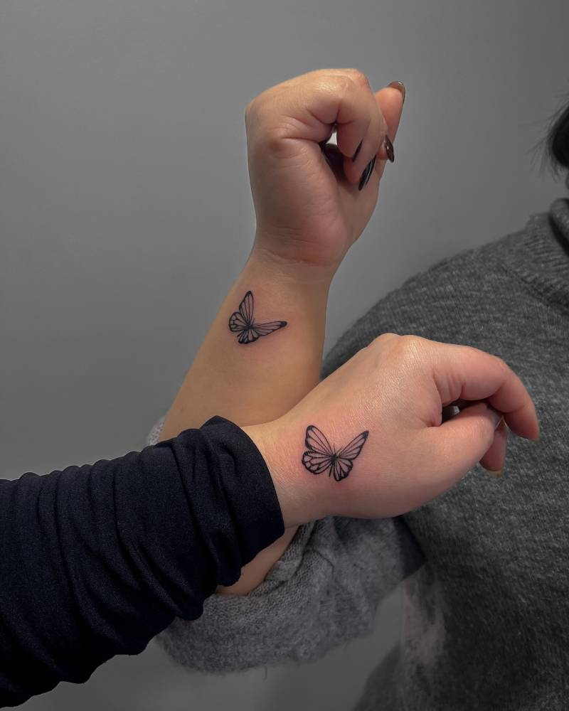 Matching butterflies tattoo for best friends.