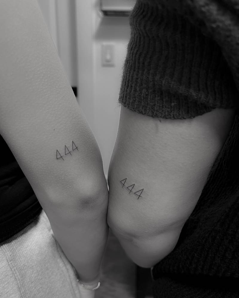 Matching angel number "444" tattoo for best friends.