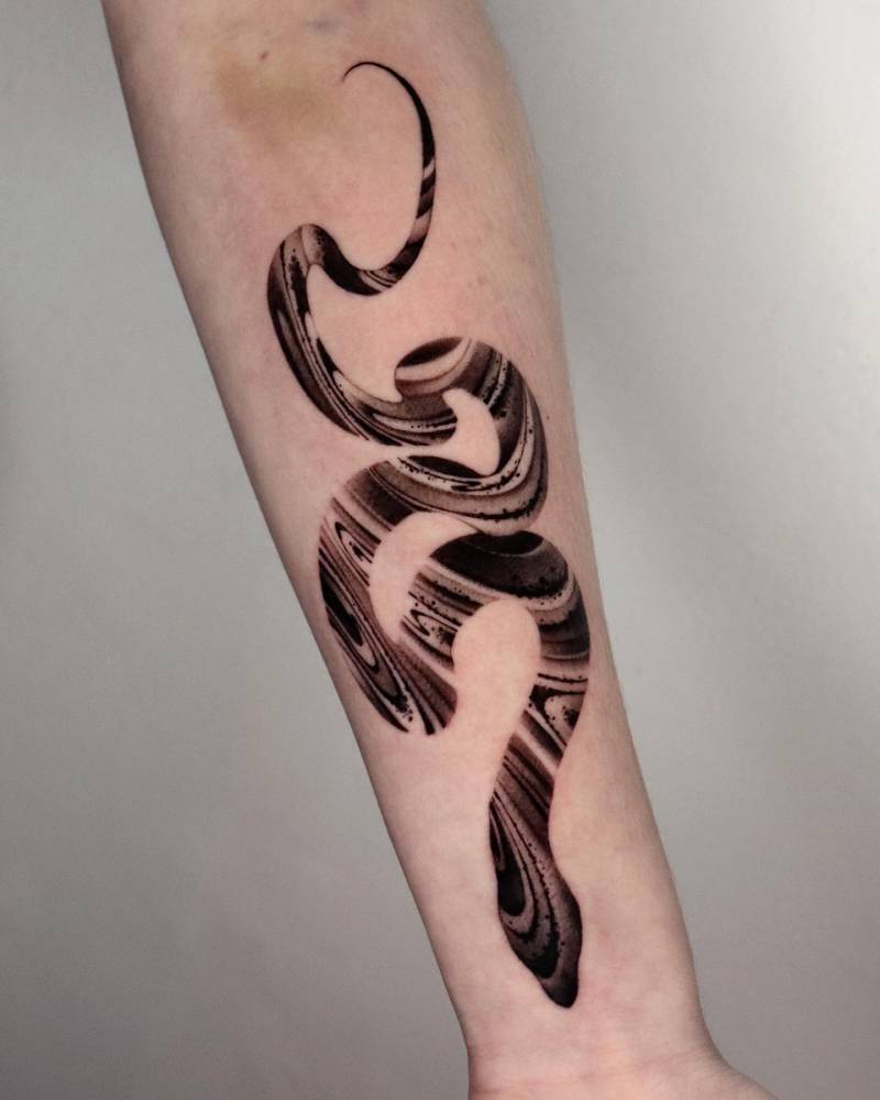Blackwork style snake tattoo located on the inner forearm.