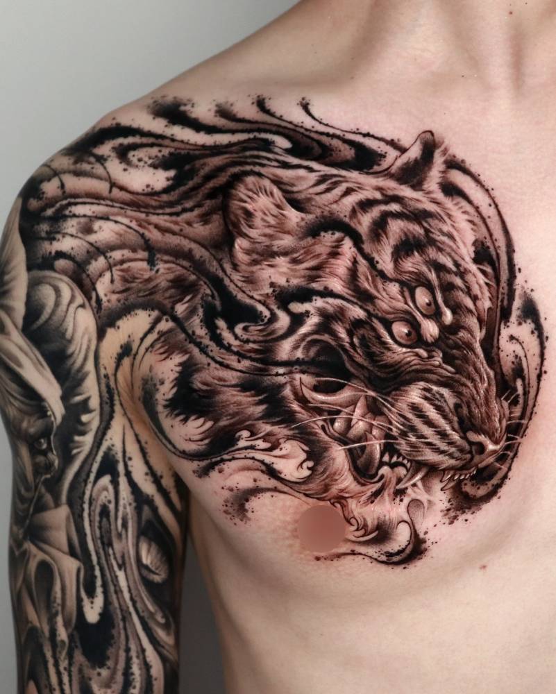 Abstract tiger portrait tattoo in black and grey style.