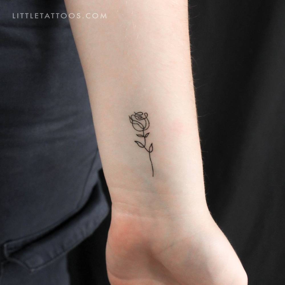 Single line rose temporary tattoo placed on the wrist.