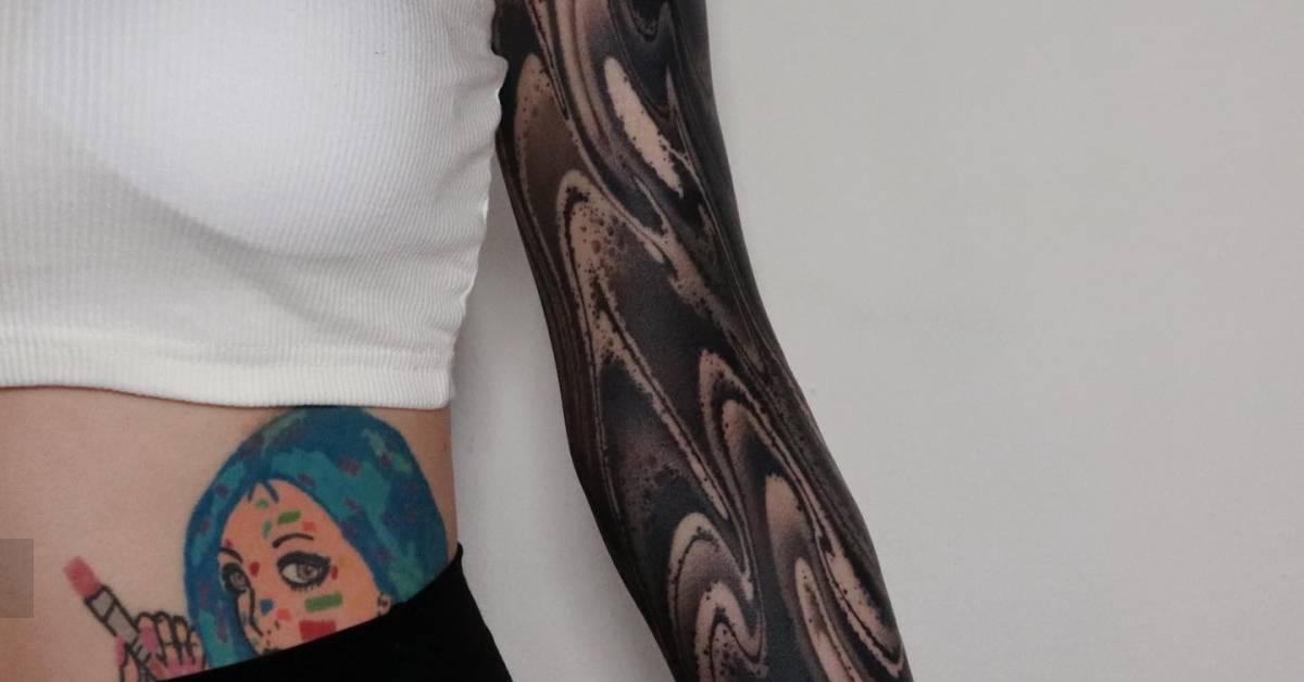 Blackwork style abstract tattoo sleeve.