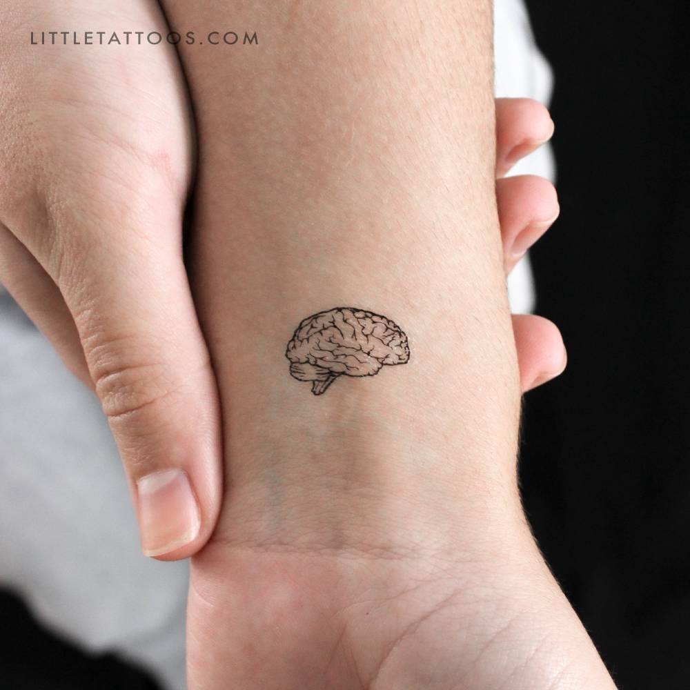 Small brain temporary tattoo located on the wrist.