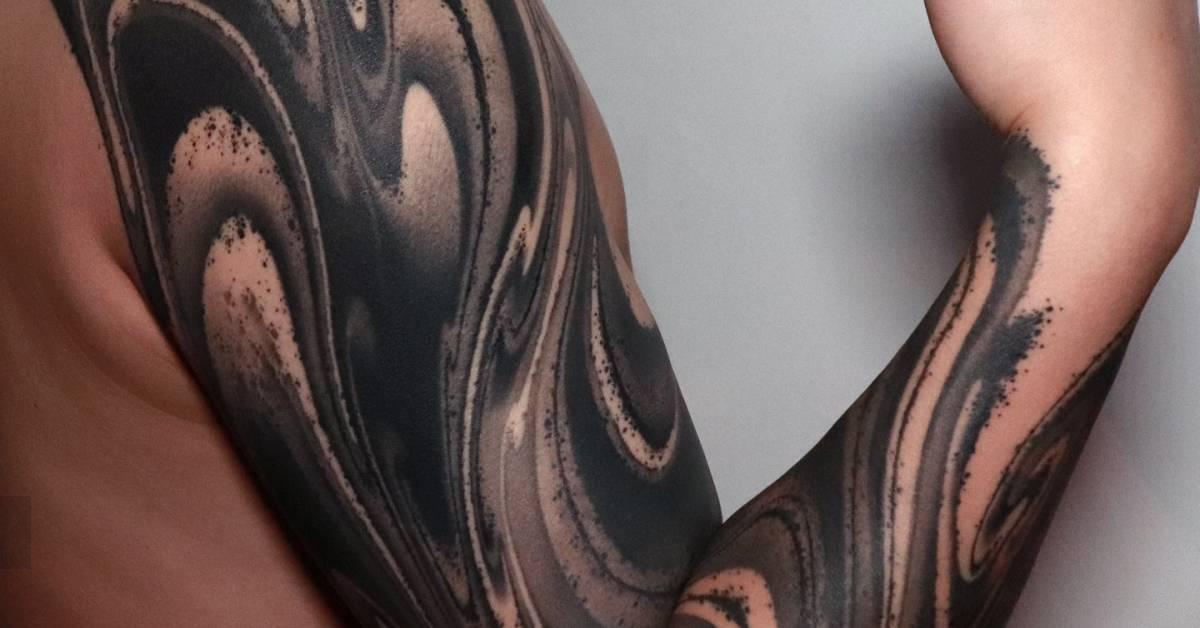 Blackwork style abstract tattoo sleeve.