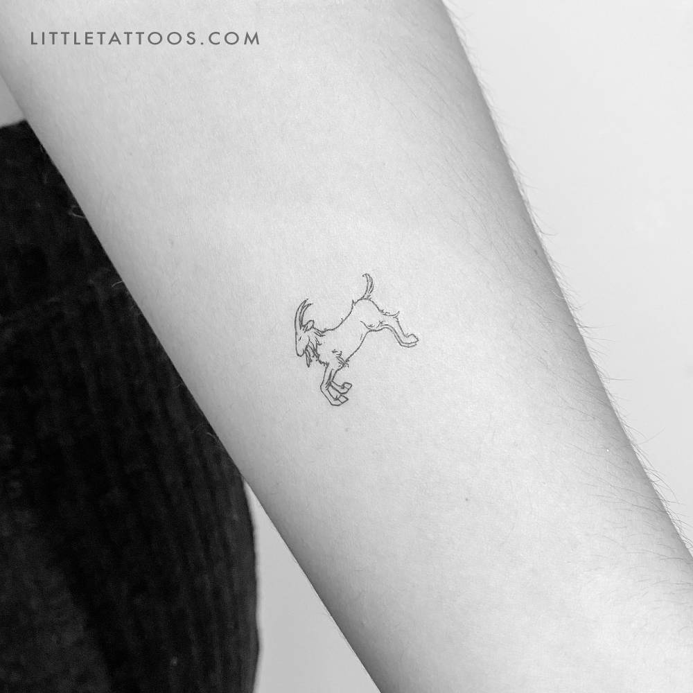Fine line style goat temporary tattoo located on the inner forearm.