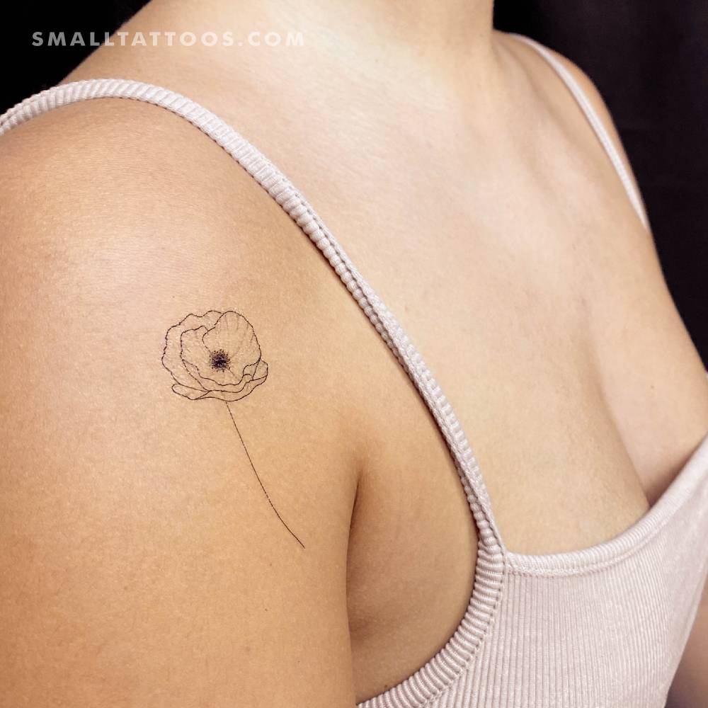 Fine line style poppy temporary tattoo done on the shoulder.