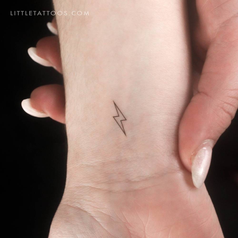 Small lightning bolt outline temporary tattoo