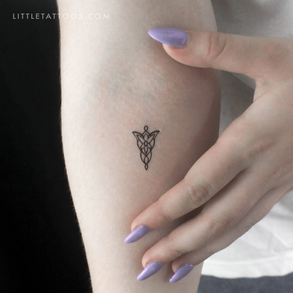 Evenstar temporary tattoo located on the inner forearm.