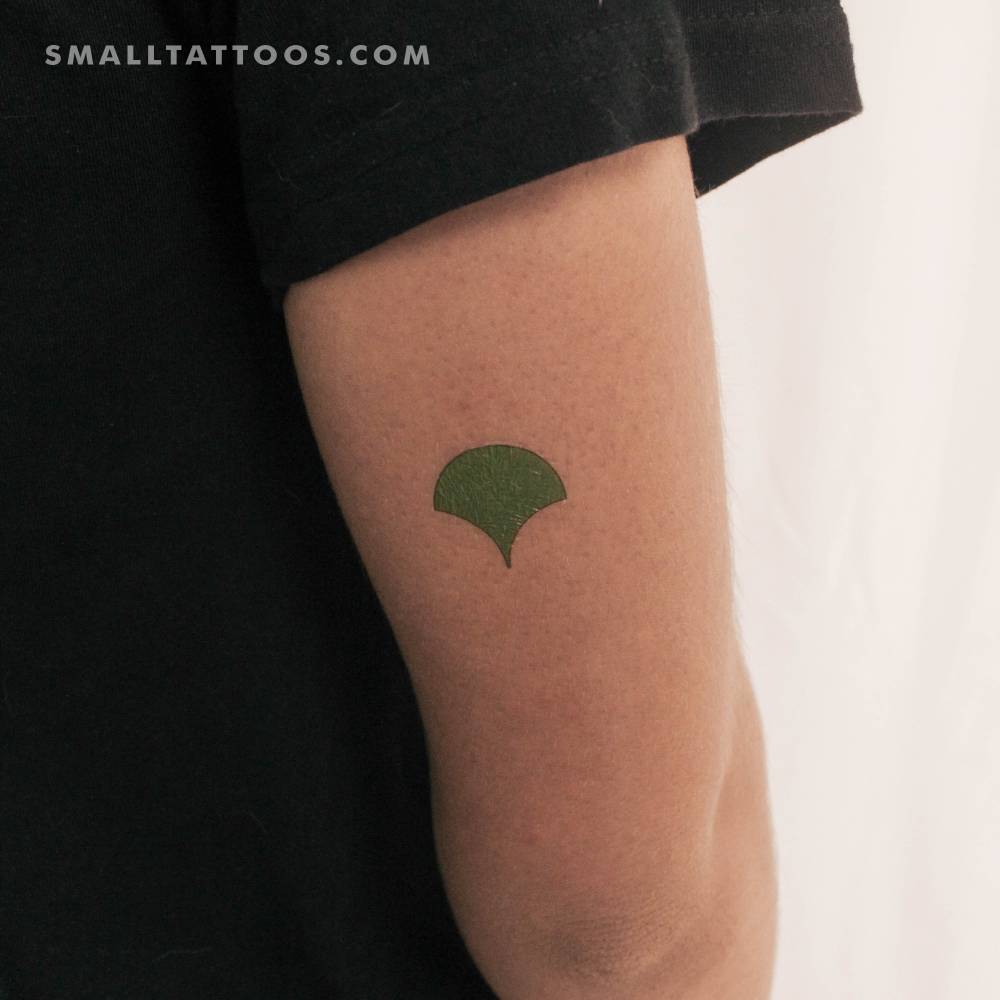 Tokyo ginkgo leaf temporary tattoo located on the tricep.