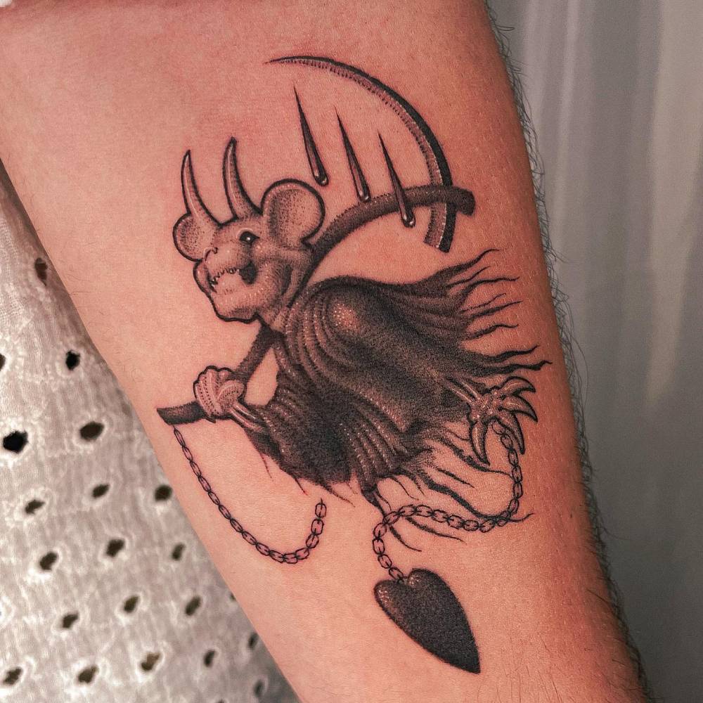 Dotwork style Grim Reaper tattoo located on the inner forearm.