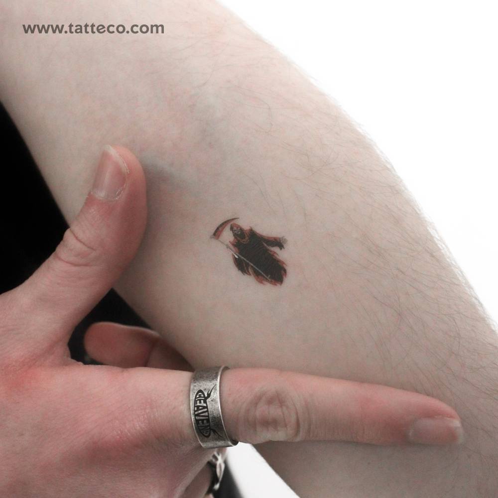 Grim Reaper temporary tattoo located on the inner forearm.