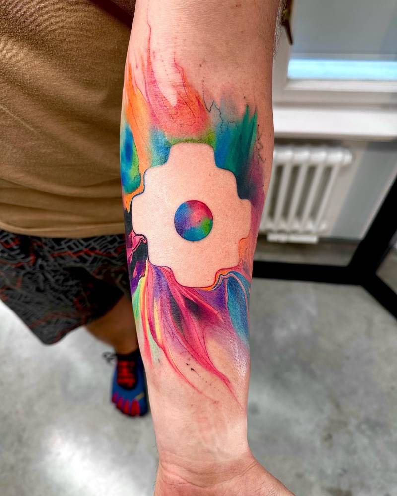Abstract style Chakana tattoo located on the inner forearm.