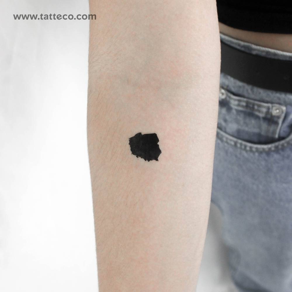 Blackwork style minimalist Poland map temporary tattoo located on the inner forearm.