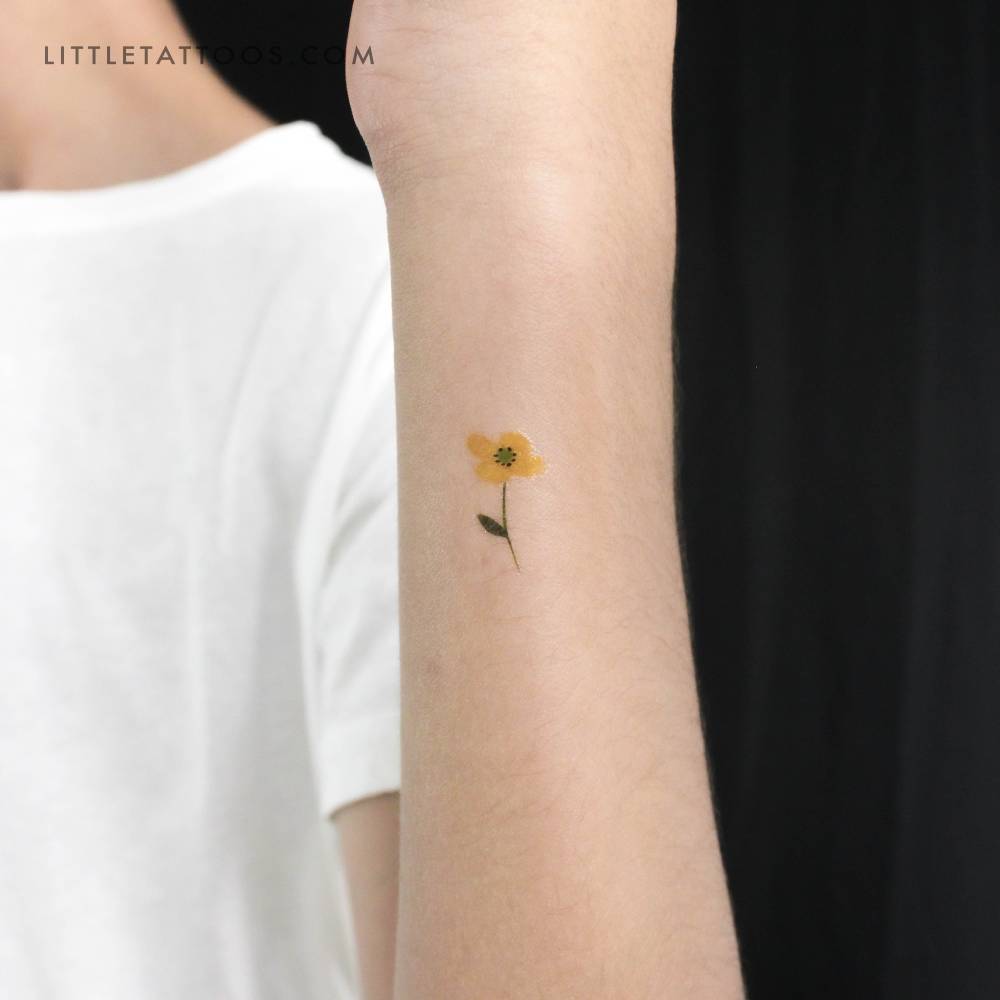 Small yellow flower temporary tattoo by Zihee.