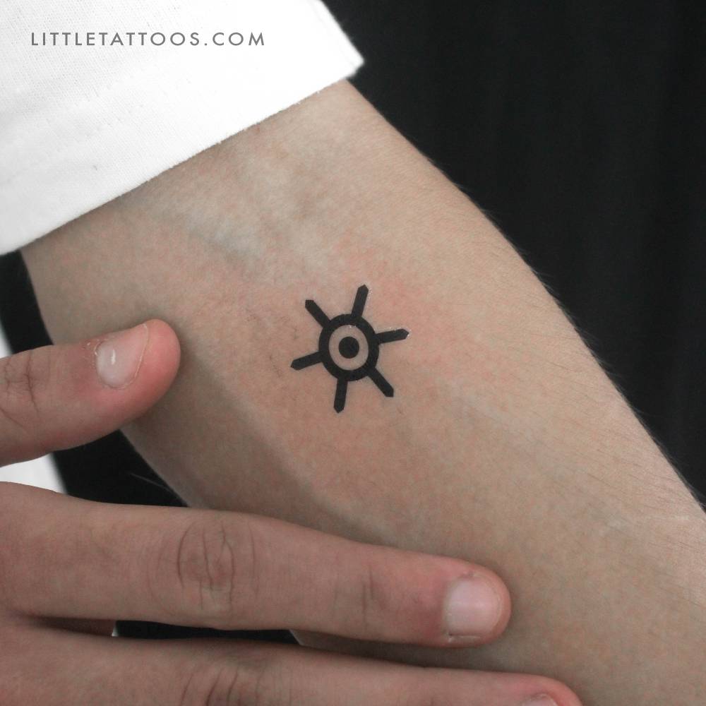 Tokyo crest temporary tattoo placed on the inner forearm.