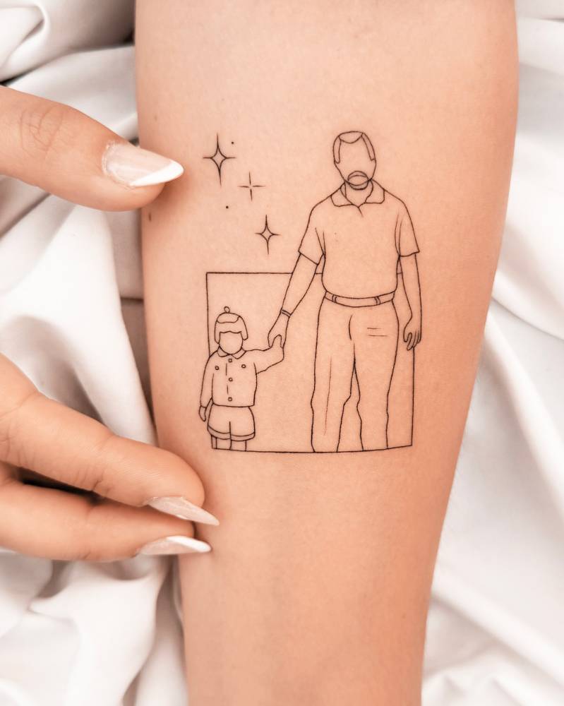 Fine line style family portrait tattoo located on the inner forearm.