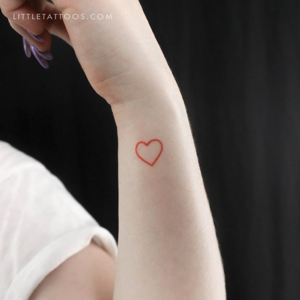 Minimalistic stryle red heart outline temporary tattoo.