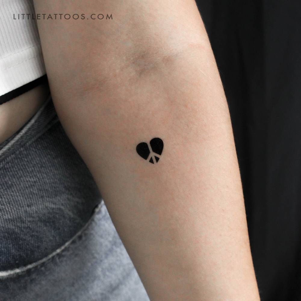 Negative space love and peace symbol temporary tattoo.