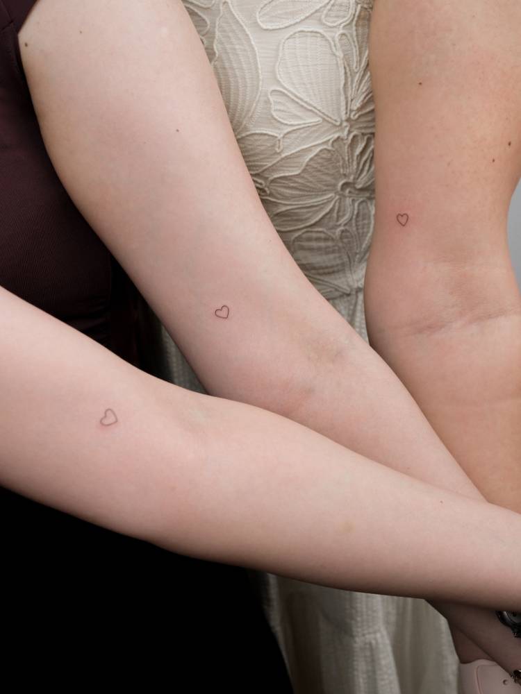 Matching minimalistic heart tattoo for best friends.