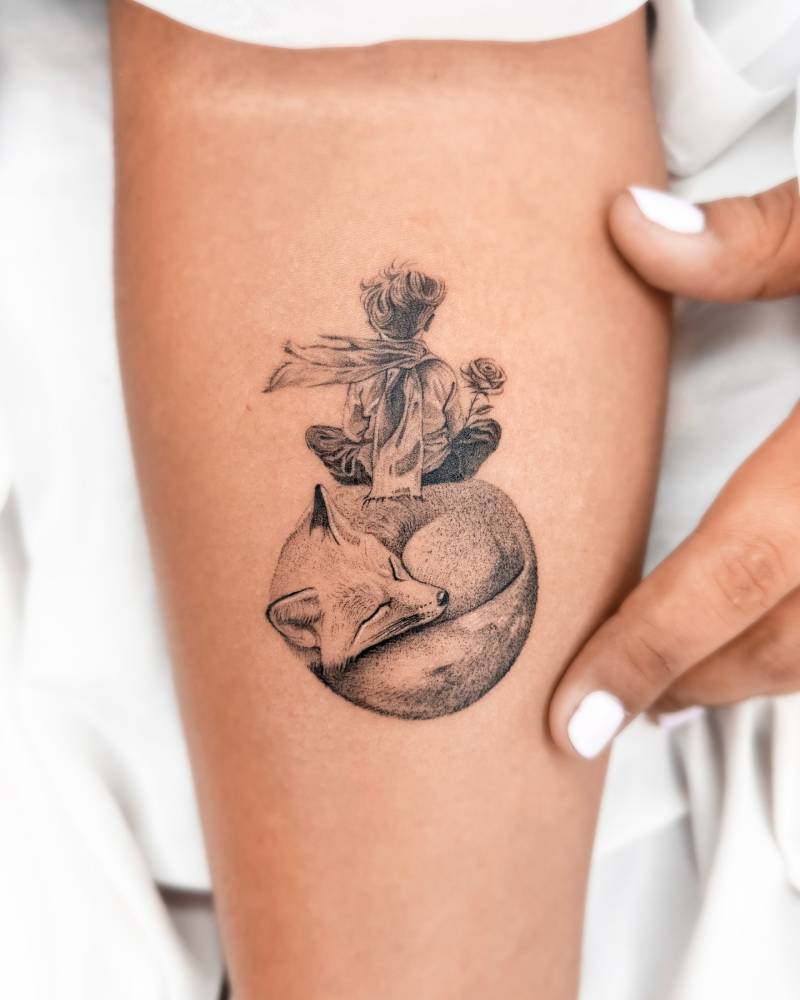 Micro-realistic style 'The Little Prince' tattoo located on the inner forearm.