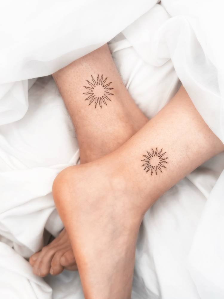 Matching fine line sun tattoo for best friends.