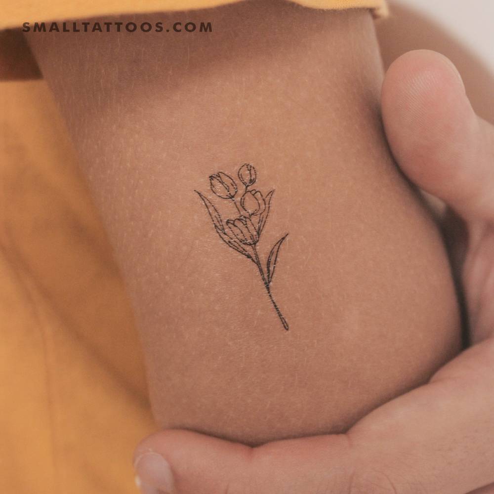 Tulip bouquet temporary tattoo located on the tricep.