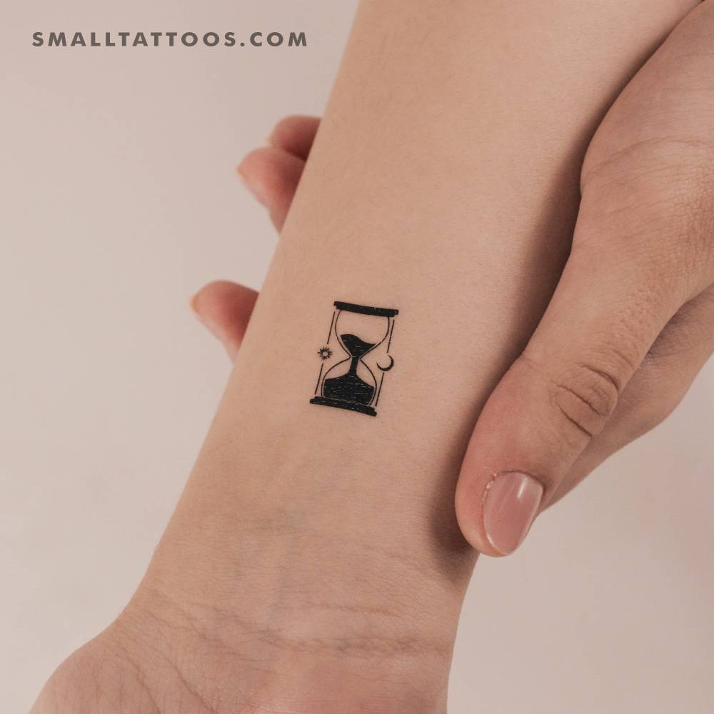 Blackwork style hourglass temporary tattoo located on the wrist.