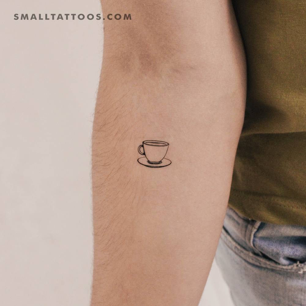 Fine line style teacup temporary tattoo located on the inner forearm.
