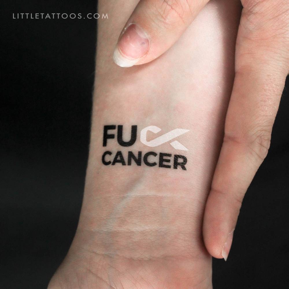Fuck bone cancer temporary tattoo located on the wrist.