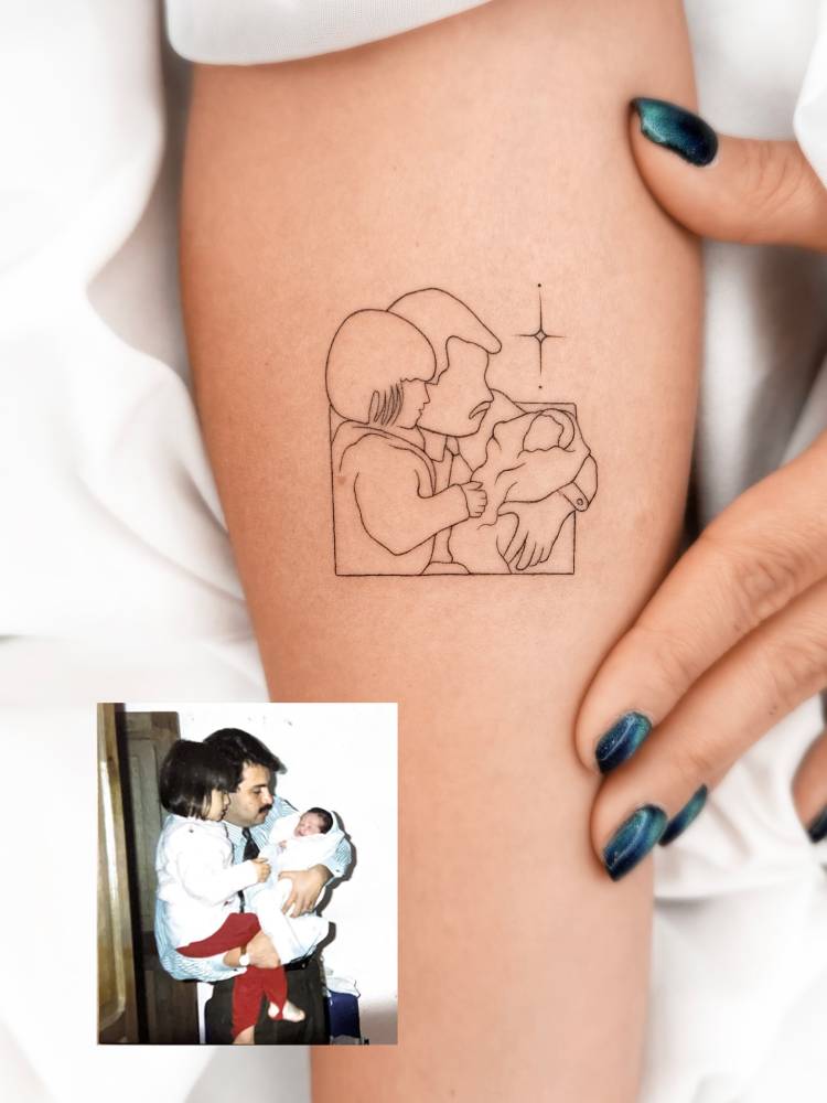 Fatherhood portrait tattoo located on the inner forearm.