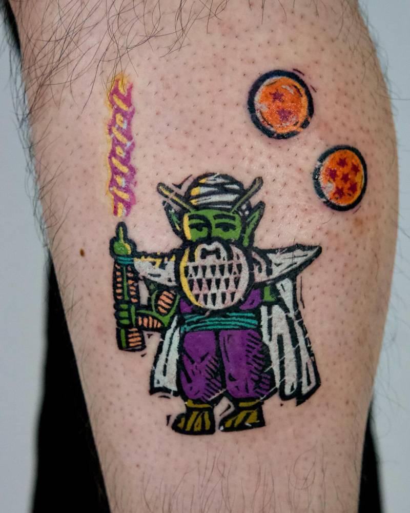 Piccolo gnome tattoo in cartoon style placed on the calf.