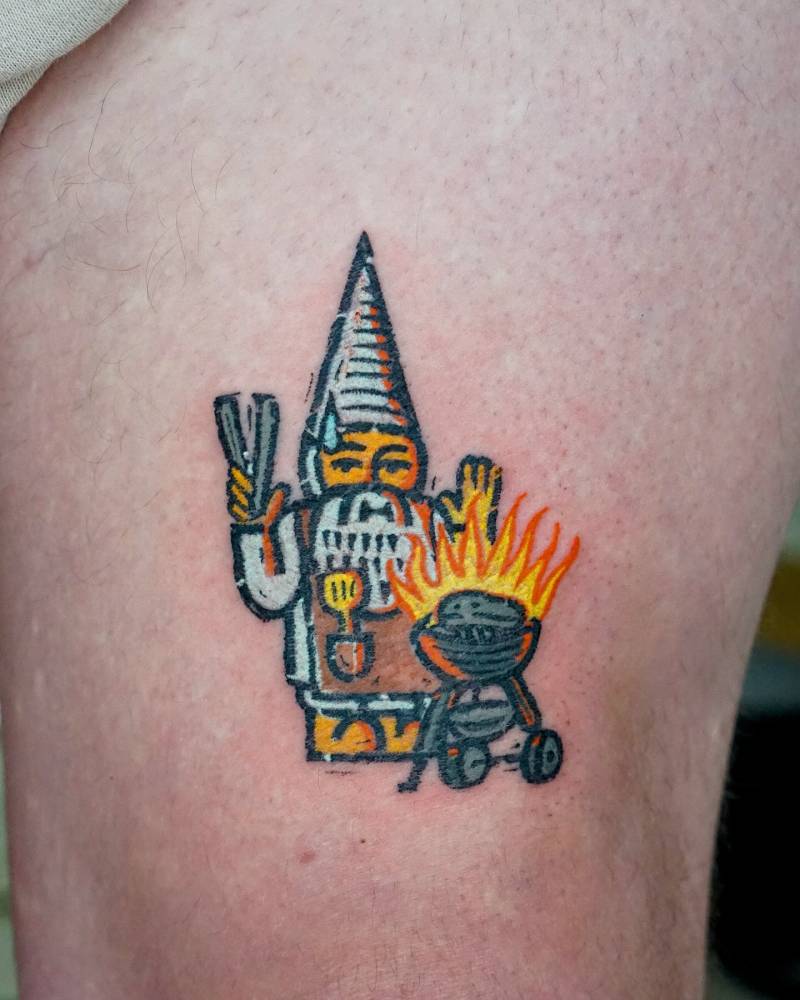 BBQ gnome tattoo located on the thigh, pop art style.