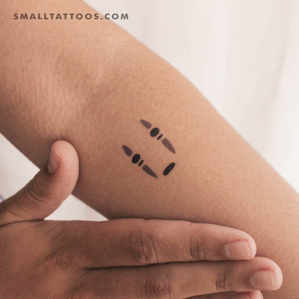 No-Face temporary tattoo located on the inner forearm.