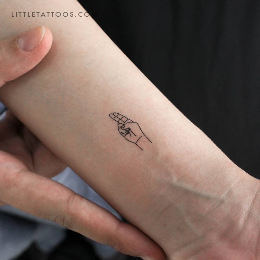 Minimalistic style sign language "U" temporary tattoo.