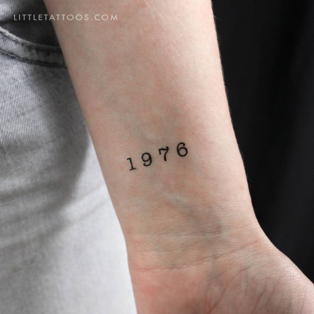 Typewriter font "1976" birth year temporary tattoo.